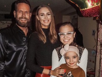 Viktor Rajek and his wife, Veronika Rajek, took a picture with Veronika's sister Viktoria Matasova.